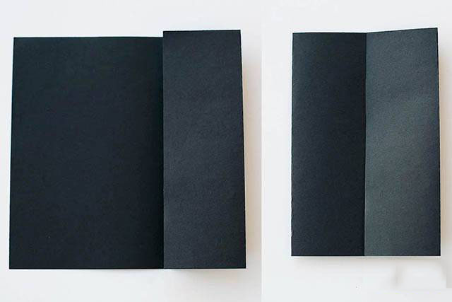 步骤2：将左右两个侧边向内折叠到和中线对齐。