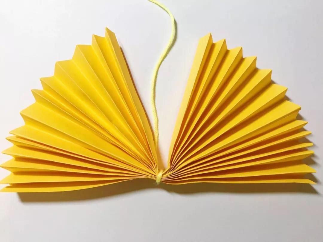 步骤3：从中心用线系紧