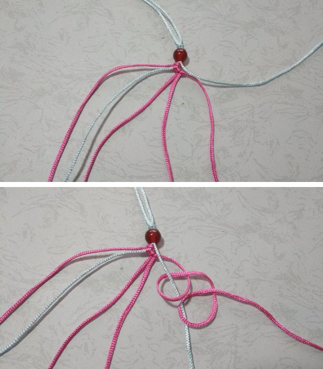 步骤5：斜卷结打好了之后，然后取一条30cm的粉色线绕雀头结，把雀头结挂在原来粉色的线上就可以了，然后拉紧，把雀头结拉到绳子的顶端。