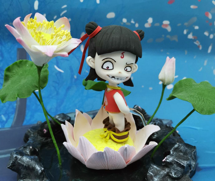 粘土制作正在撒尿的哪吒玩偶