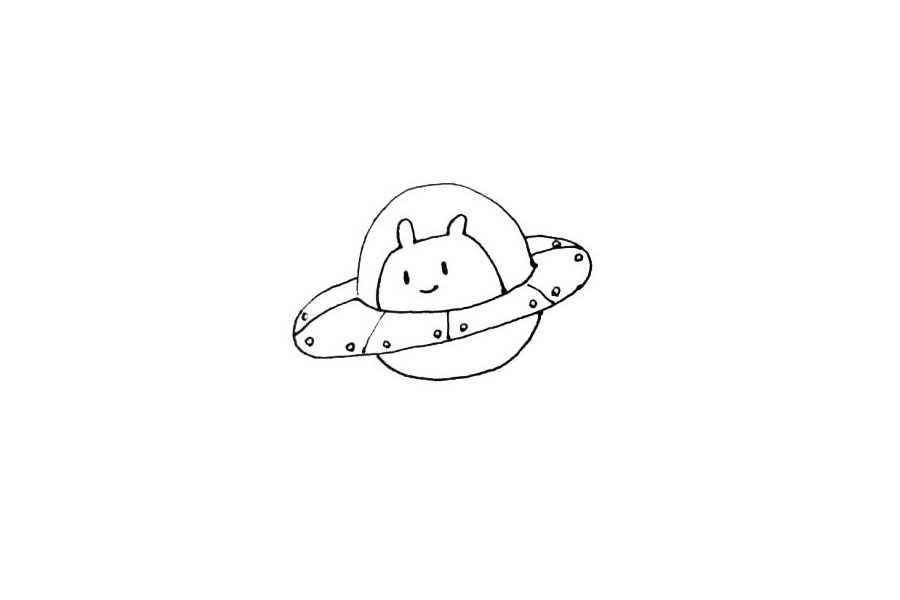 步骤5：UFO里面，再画上个可爱的外星生物，记得点上小眼睛和笑脸。