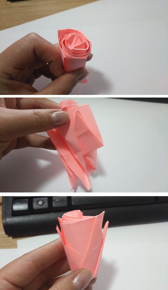 步骤9：把4条边往中间卷，顺着一个方向，全部卷成一个。就是我图上的样子，卷好了之后，然后侧面把之前折的三角形往上对折的，沿着折痕把三角形往上对折，注意一个压一个，总共4个三角形。