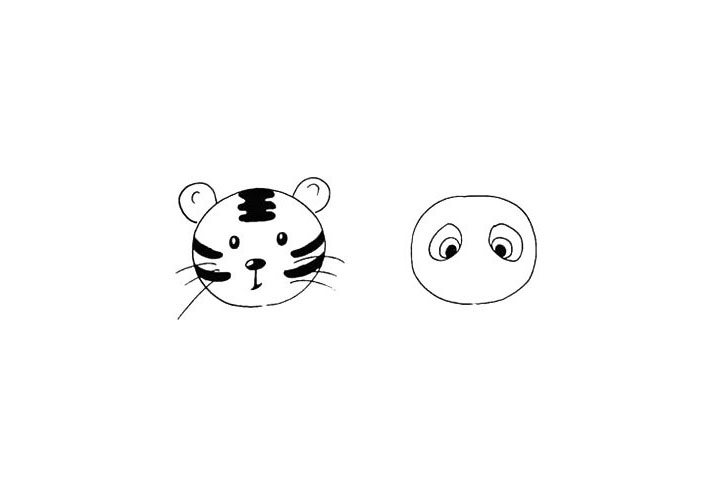 步骤10：里面画上两只大大的眼睛.这是一只熊猫。