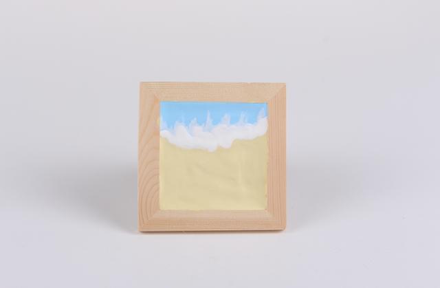 步骤3：大海和沙滩交界的部分用白色粘土做出浪花的样子，如下图所示。