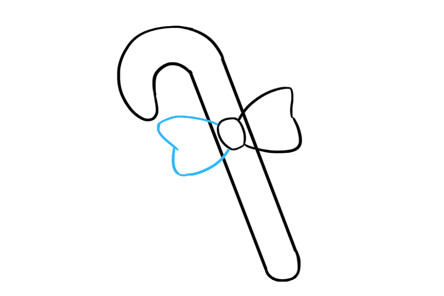 步骤5：重复最后一步中描述的过程以形成镜像。同样，使用一条长的曲线将弓的一侧围起来。