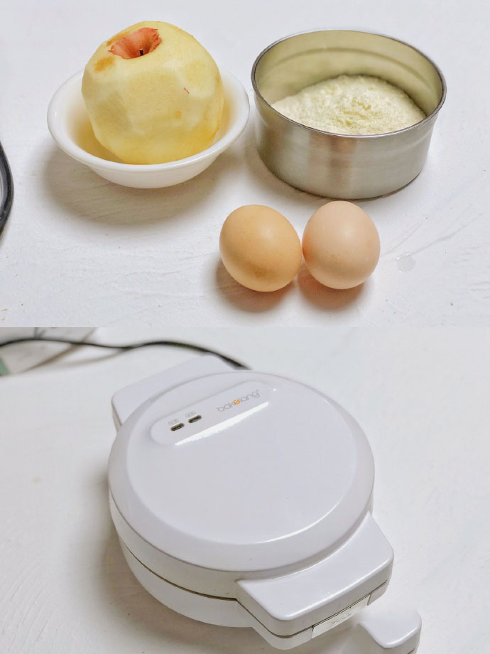 食材准备:苹果3/4，面粉30g，鸡蛋2枚，奶粉5g