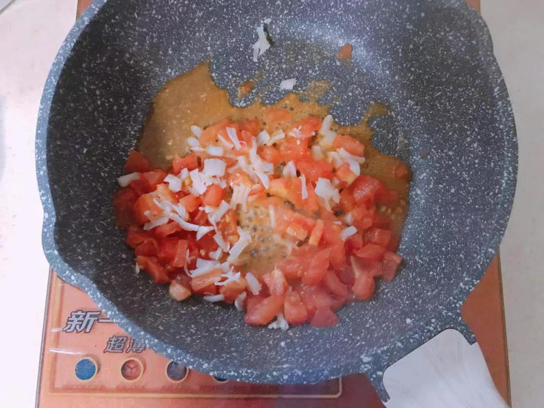 第7步：加入干贝翻炒。