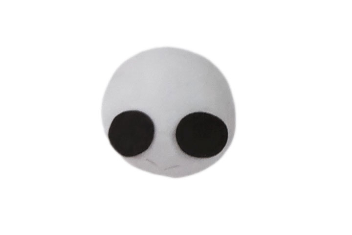 步骤3：把黑色眼圈粘在头部。