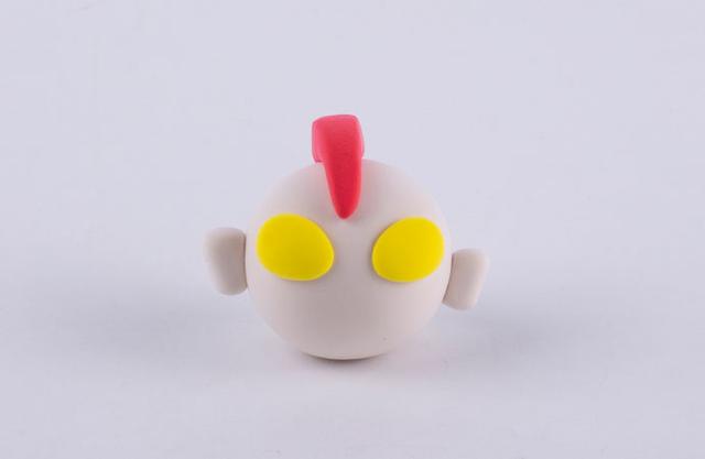 步骤3：把眼睛、耳朵和头镖粘好。