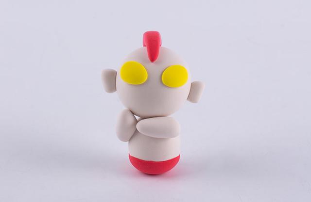 步骤8：把胳膊粘好并摆好造型，这个造型是奥特曼的经典造型，一般情况下这就表示他要发射奥特光线了