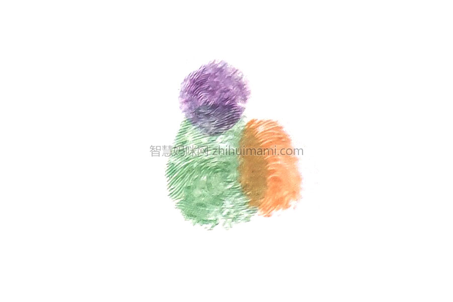 步骤3：伸出食指蘸取颜料，在画纸上按出鹦鹉的翅膀。