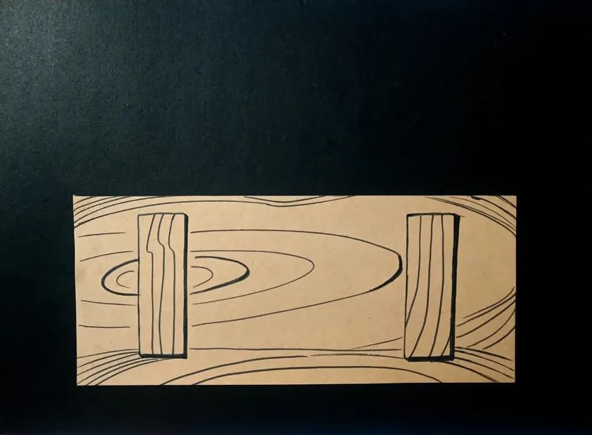 步骤2：接着我们用一张长方形牛皮纸结合黑色勾线笔绘制木箱效果。