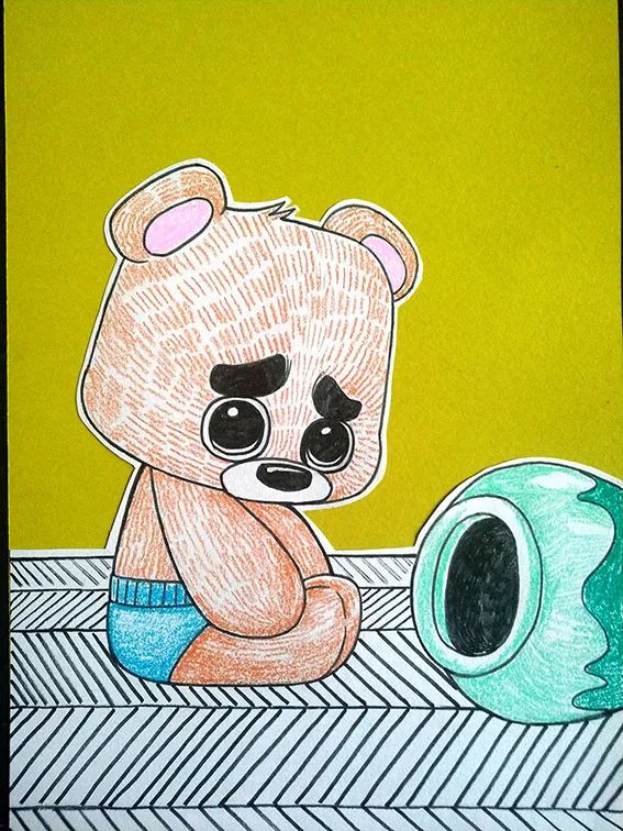 步骤5：把画好的画面剪下，粘贴到准备好的黄色卡纸上。