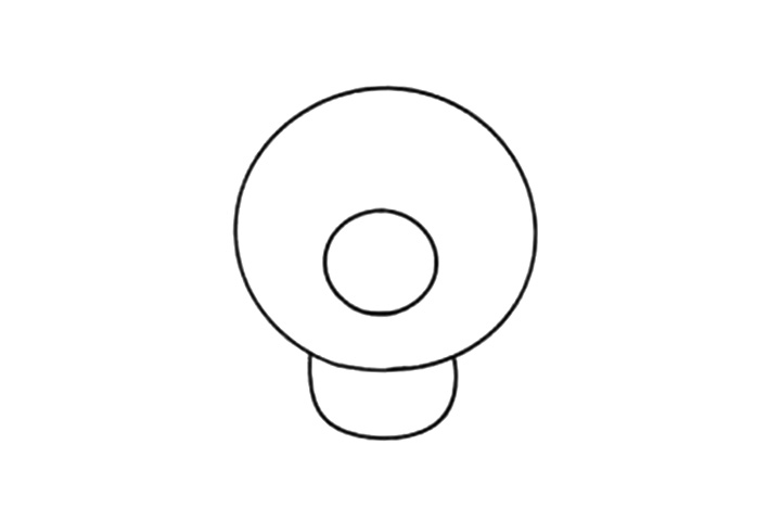 步骤2：再在圆形里头画一个椭圆形。