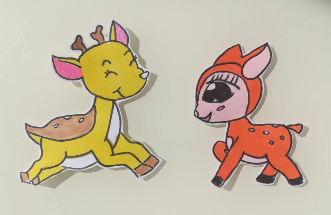 步骤7：将梅花鹿涂上漂亮的颜色后剪下来。