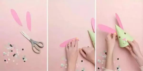 步骤2：小兔子的两只耳朵，小眼睛、小鼻子，还有小胡须需要我们剪出来。还要画出嘴巴。