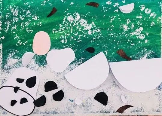 步骤3：用卡纸剪出奶牛的轮廓部件。