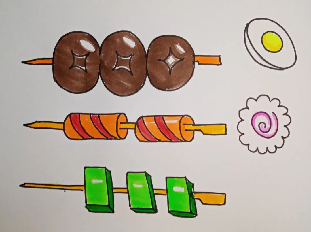步骤5：同样用马克笔或水彩笔给食材涂上漂亮的颜色。