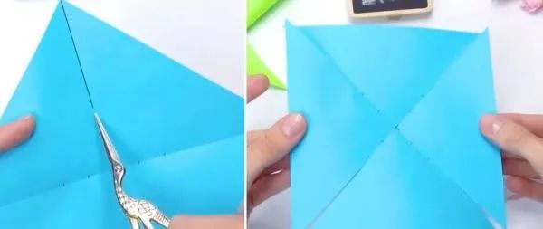 步骤2：用剪刀剪开折线，注意不要剪到中心点。