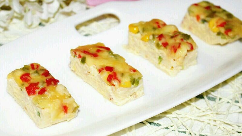 原来宝宝面条还能这么做？太有营养了！
面条芝士杂蔬披萨的做法图解11