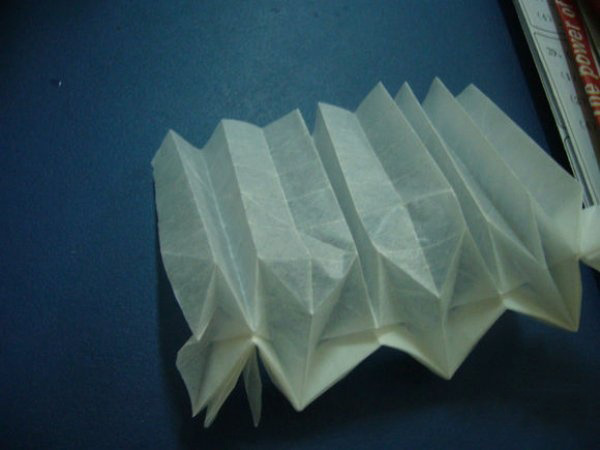 很有创意的龙头戒指造型手工戒指折纸图解